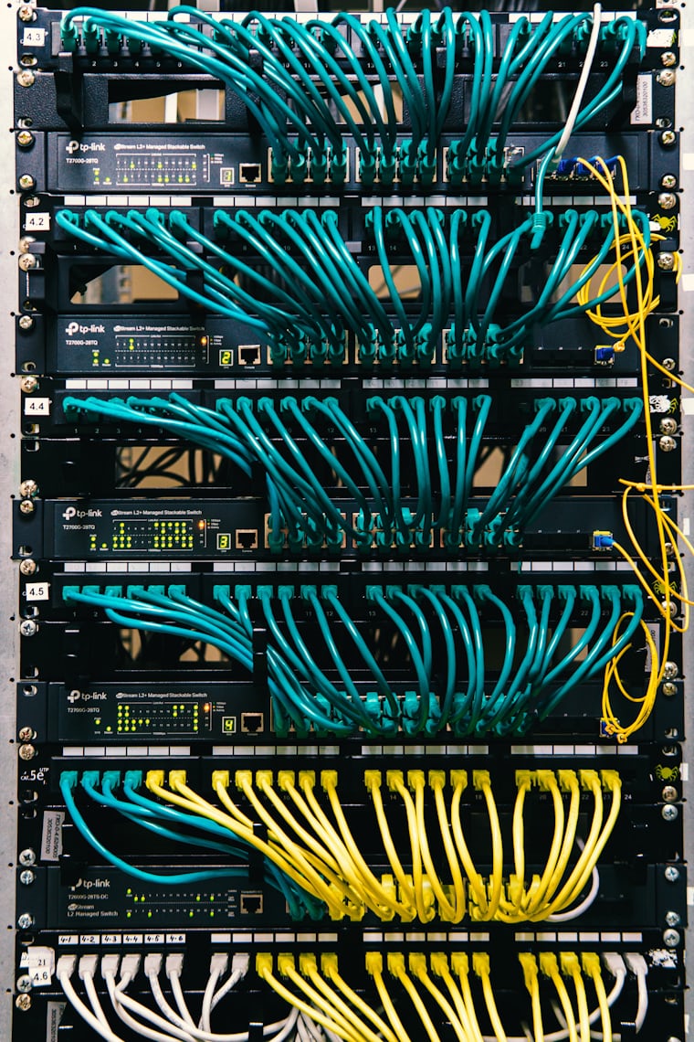 Structured network cabling and patch panels in a rack